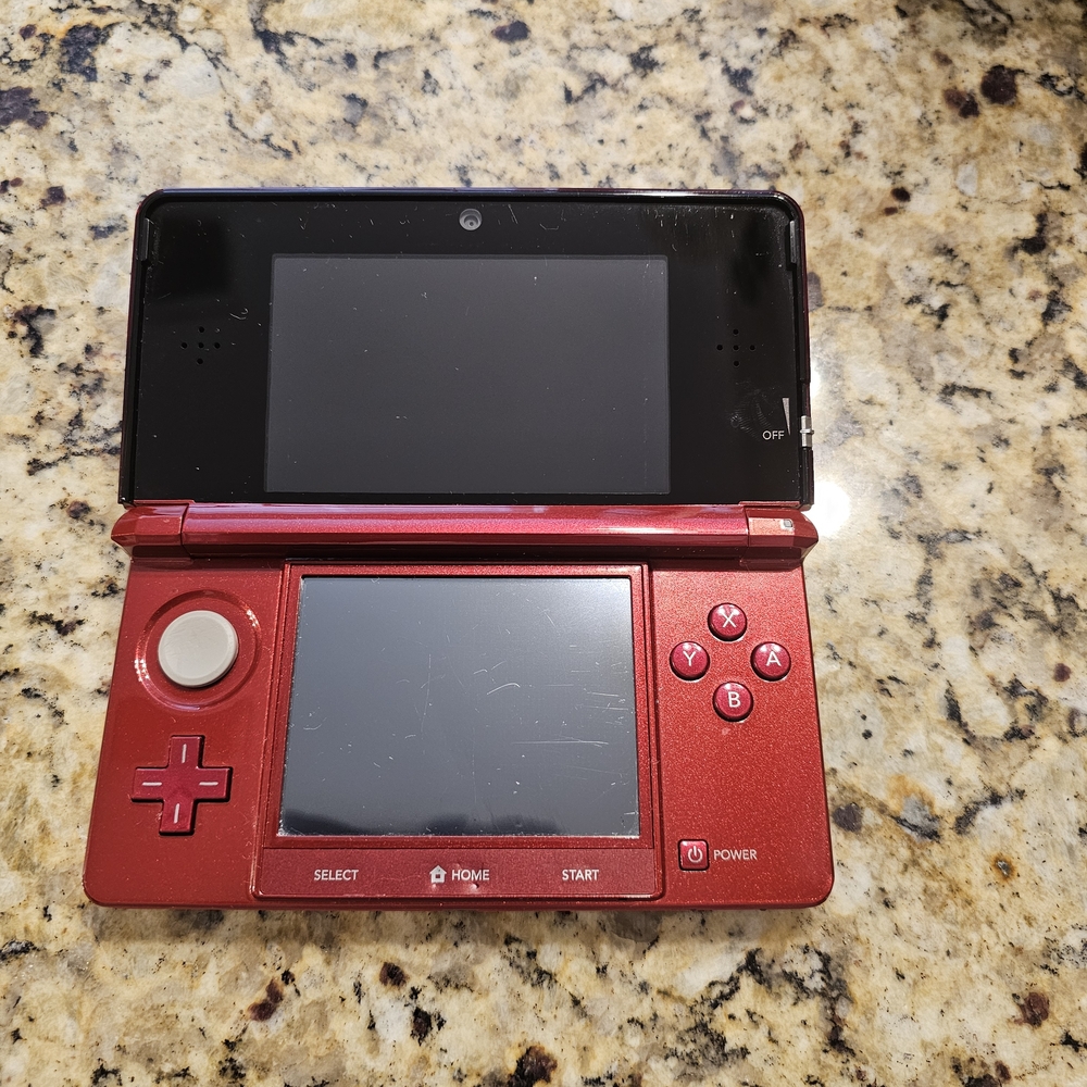 Red Nintendo Handheld Gaming Console